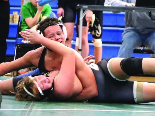 Blues Boast Three Titles