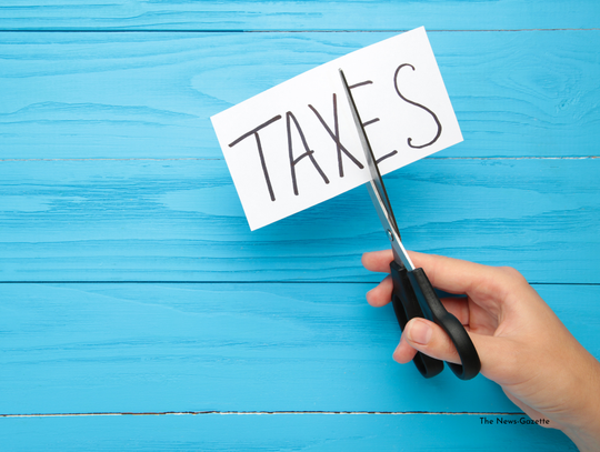 City Cuts Tax Rate