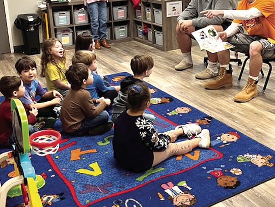 RC Boys Basketball Players Visit YMCA Youth Center