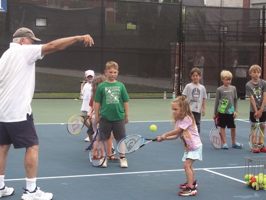 Youths Learn Tennis Skills