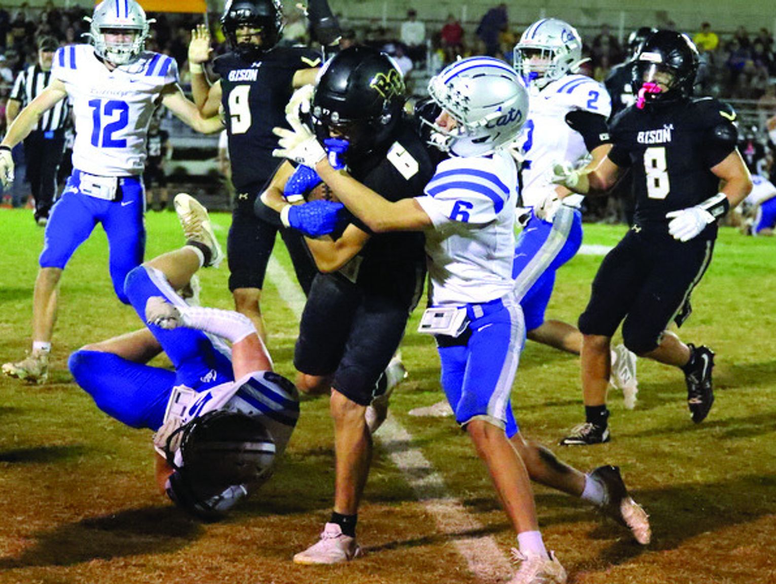 Bison Run Past ‘Cats, 59-14