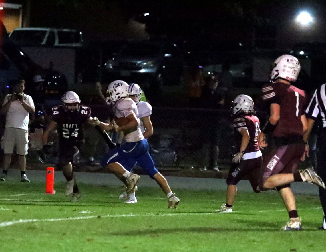 Draft Breezes Past Wildcats, 52-14