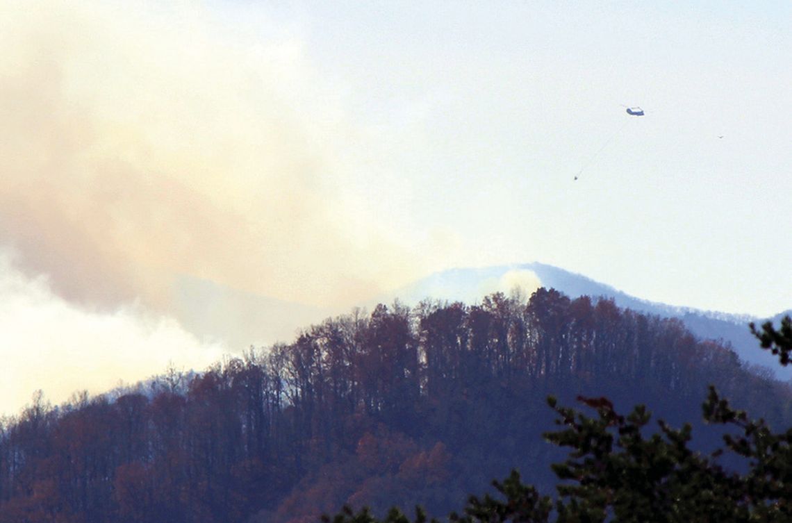 Firefighters Tackling Forest Fire Southeast Of Glasgow